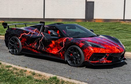 red and black fire wrapped corvette